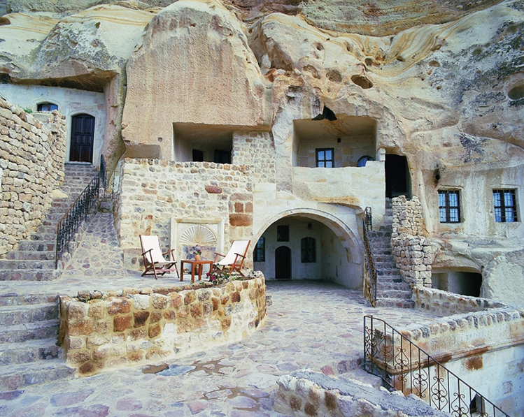 A cave hotel interior in Cappadocia carved into the soft volcanic rock